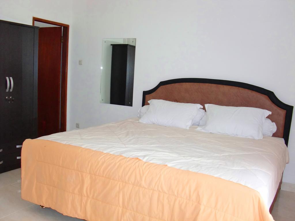 Libra Homestay Manado Bilik gambar